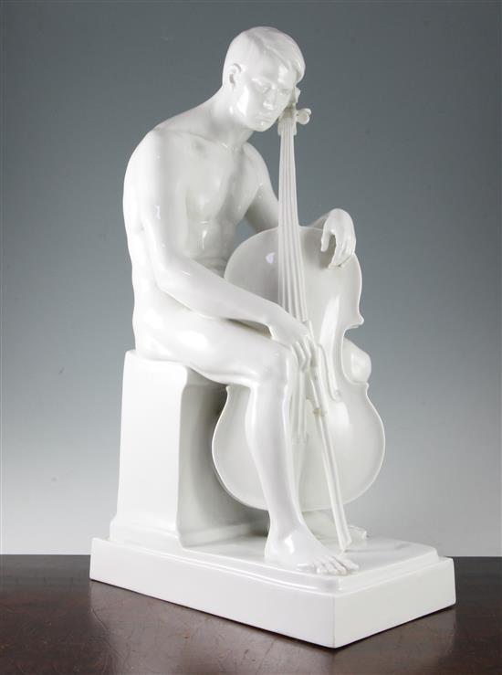 A large Rosenthal Art Deco white glazed porcelain figure of a nude cellist, 57cm, repair to bow
